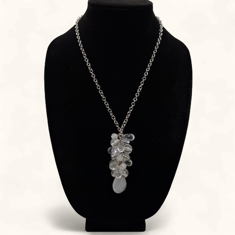 Silver chain necklace with clear glass-like leaf-shaped charms